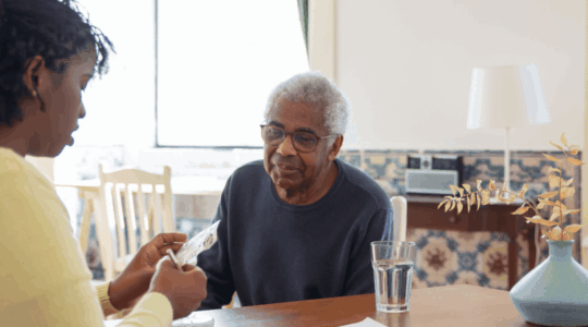 Daughter-helping-elderly-father